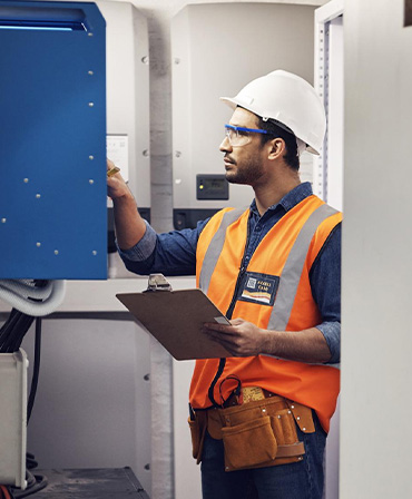 Licensed Electrician Performing Electrical Safety Inspection